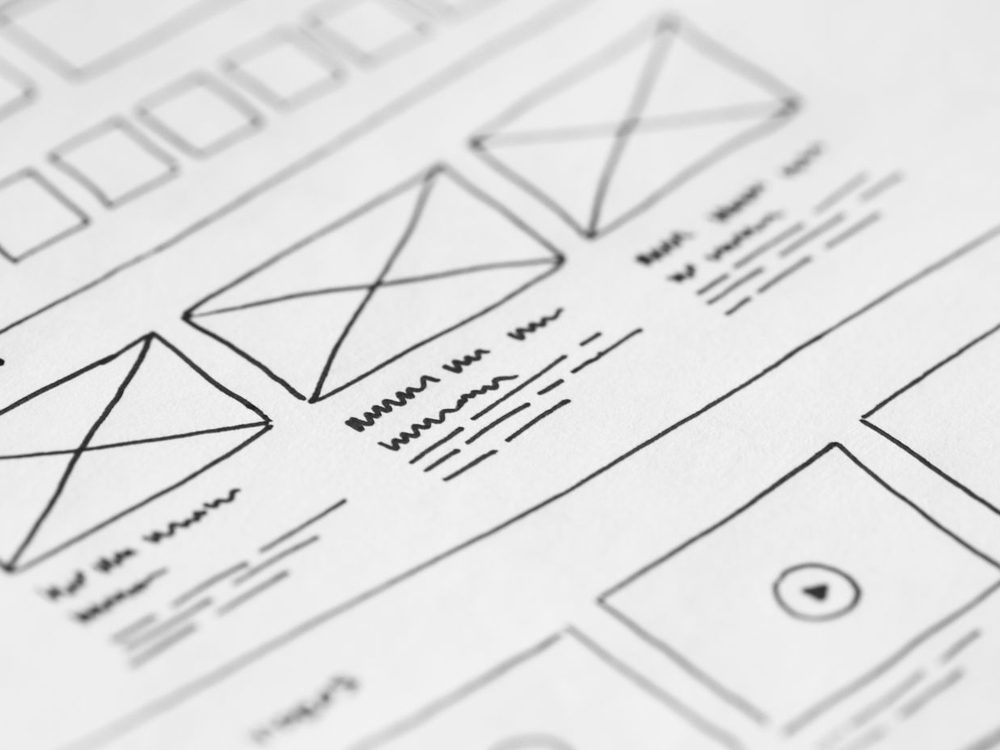 Hand-drawn website wireframes